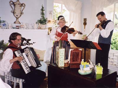 Musicians perform Swedish songs during the Midsummer Celebration at Klaradal.